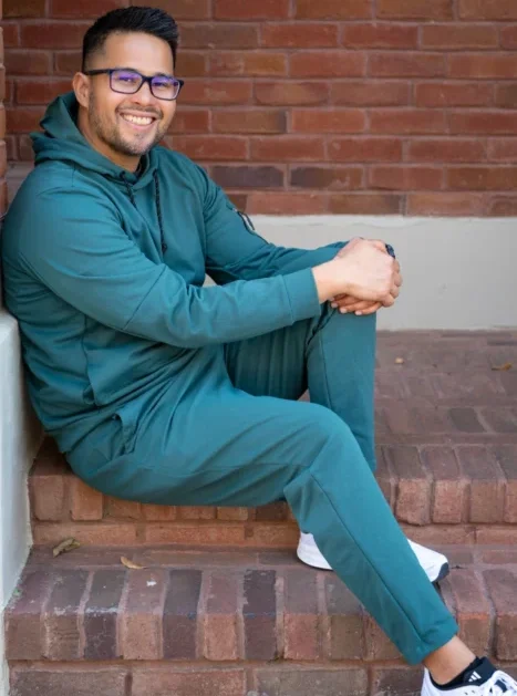 Mark sison in a green hoodie looking fit, family specialist in southlake, tx