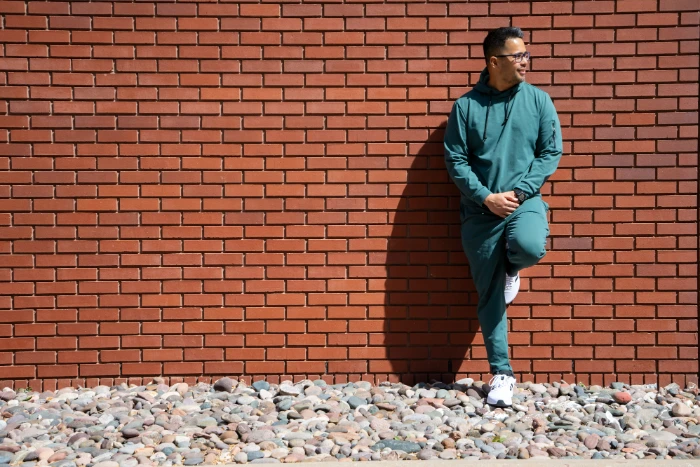 Mark sison in a green hoodie looking fit, health coach in southlake, tx